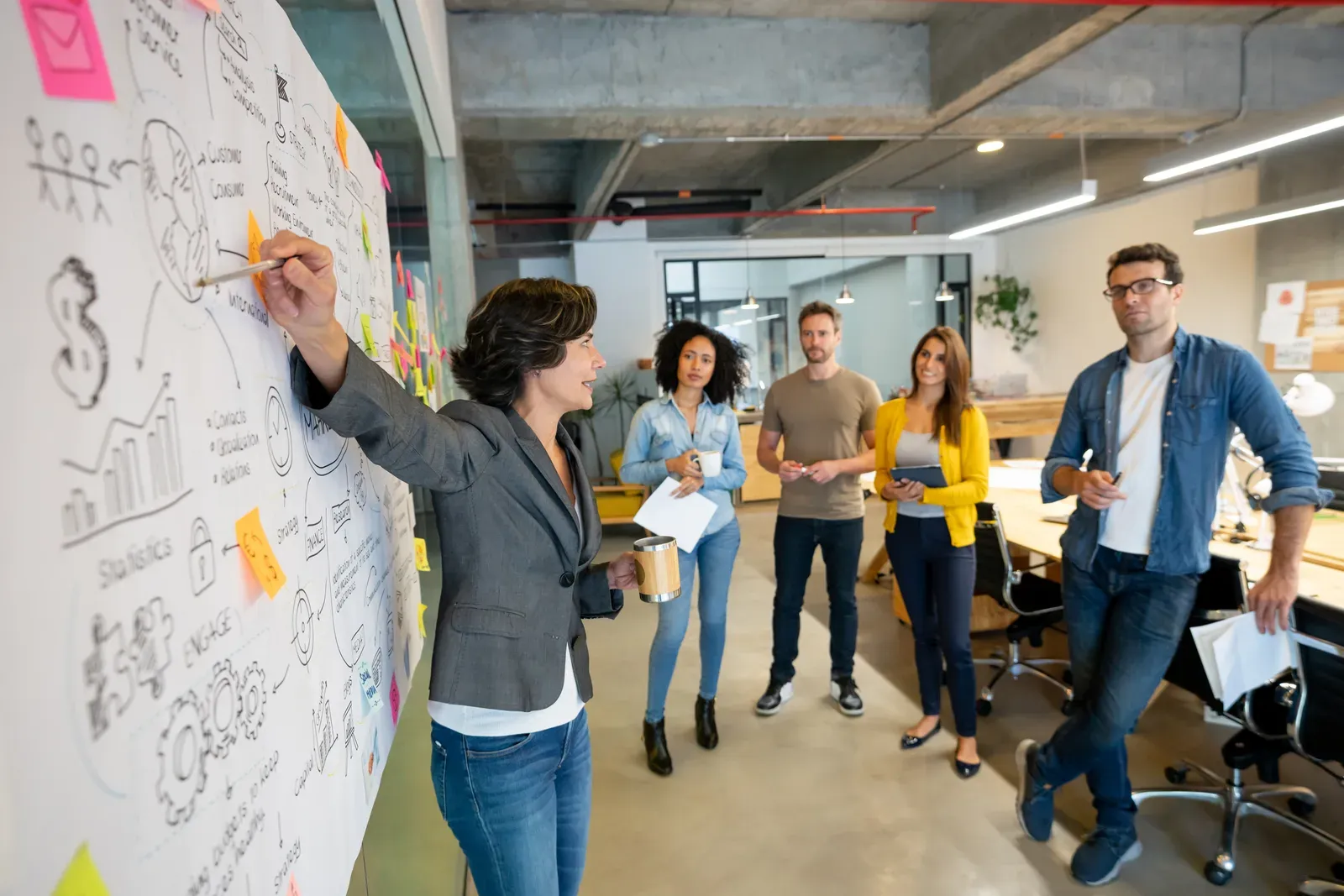 Woman giving a business presentation in a creative office space