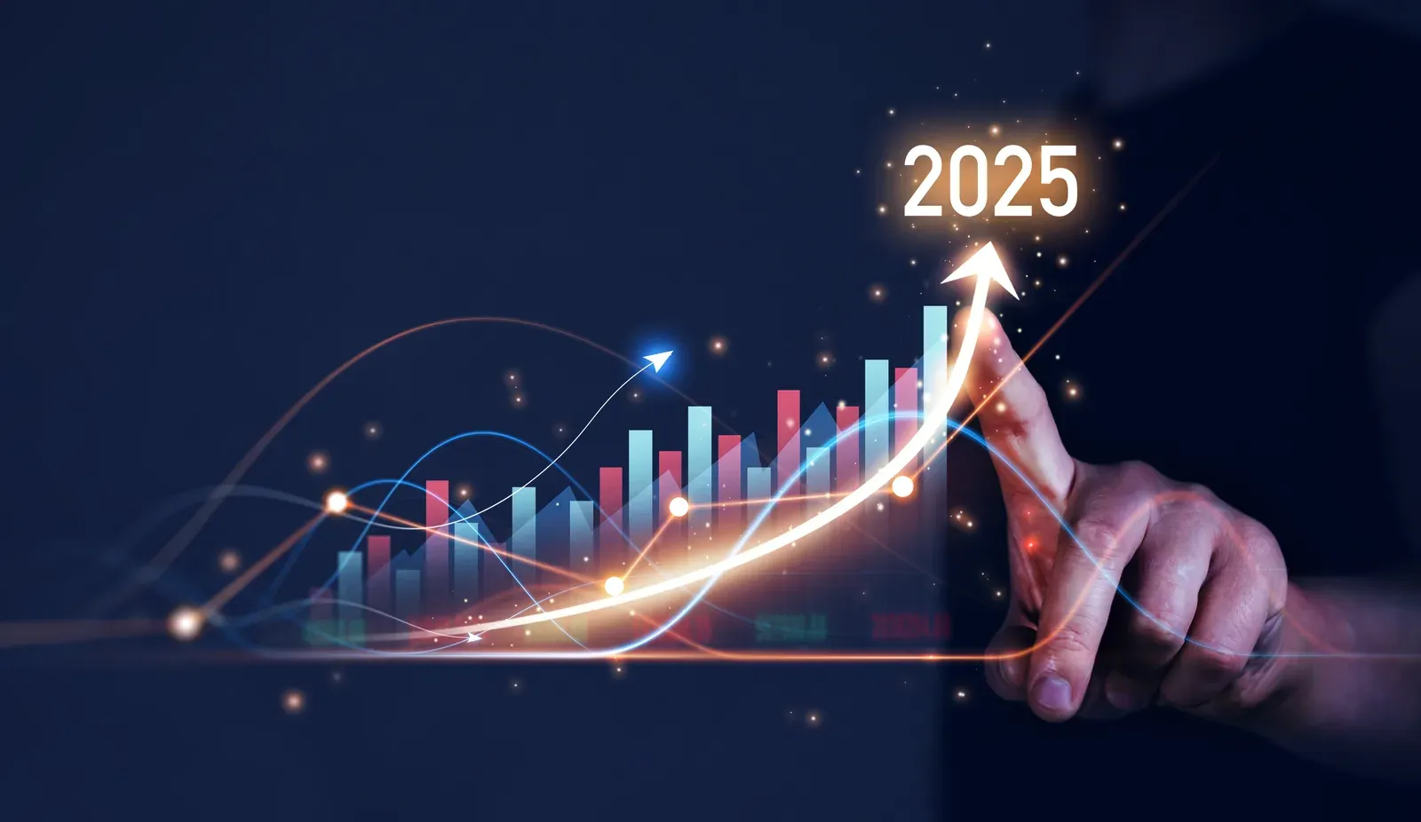 Businessman drawing a rising growth arrow over a 2025 goals chart